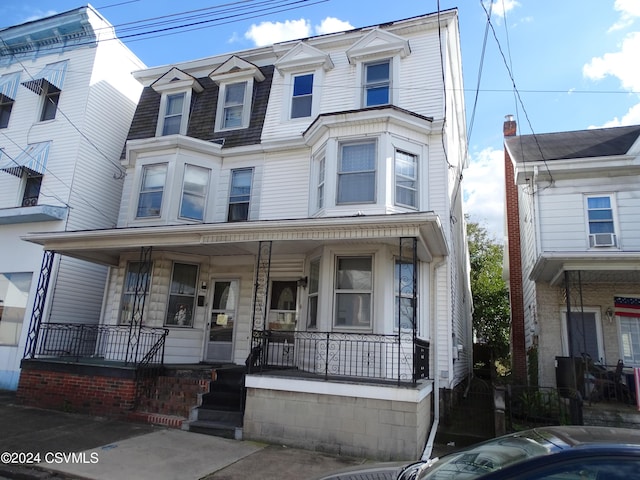 310 W 3rd St, Mount Carmel, PA 17851 - view of property featuring cooling unit and a porch