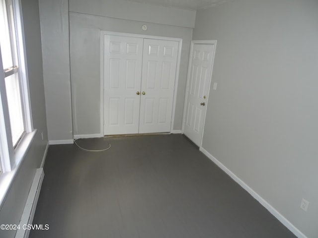 310 W 3rd St, Mount Carmel, PA 17851 - unfurnished bedroom with a closet and baseboards