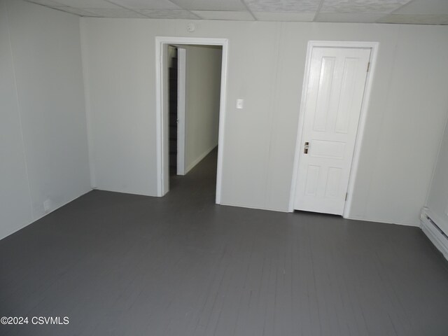310 W 3rd St, Mount Carmel, PA 17851 - empty room featuring a drop ceiling and dark wood-style floors