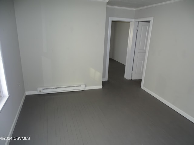 310 W 3rd St, Mount Carmel, PA 17851 - spare room with baseboards, ornamental molding, and a baseboard radiator