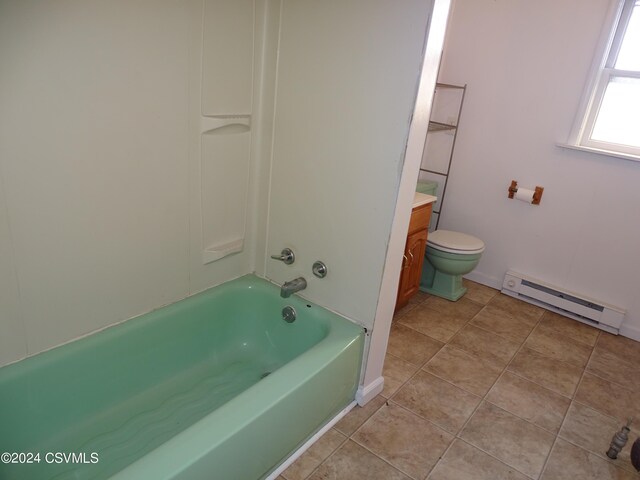 310 W 3rd St, Mount Carmel, PA 17851 - full bathroom with a bath, vanity, tile patterned floors, a baseboard heating unit, and toilet