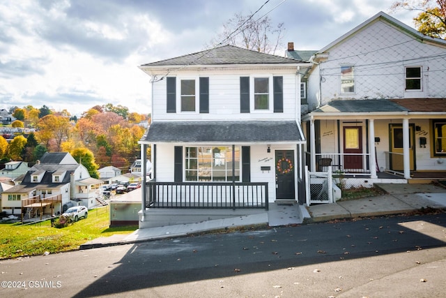 1766 W Chestnut St, Coal Township, PA 17866 - view of front of property featuring a porch and roof with shingles