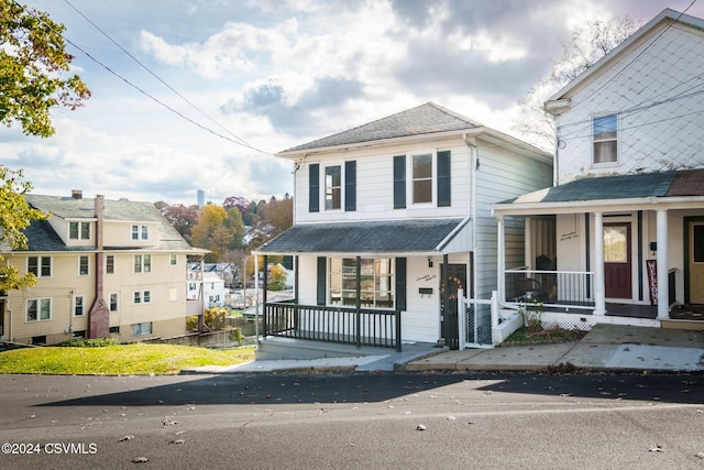 1766 W Chestnut St, Coal Township, PA 17866 - view of front of property featuring a porch and roof with shingles