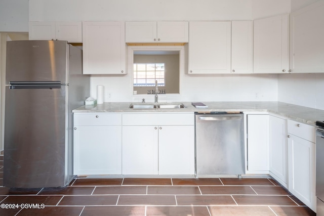 1766 W Chestnut St, Coal Township, PA 17866 - kitchen featuring stainless steel appliances, a sink, and white cabinetry