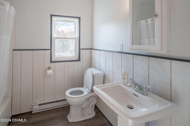 1766 W Chestnut St, Coal Township, PA 17866 - full bath featuring baseboard heating, toilet, wainscoting, a sink, and curtained shower