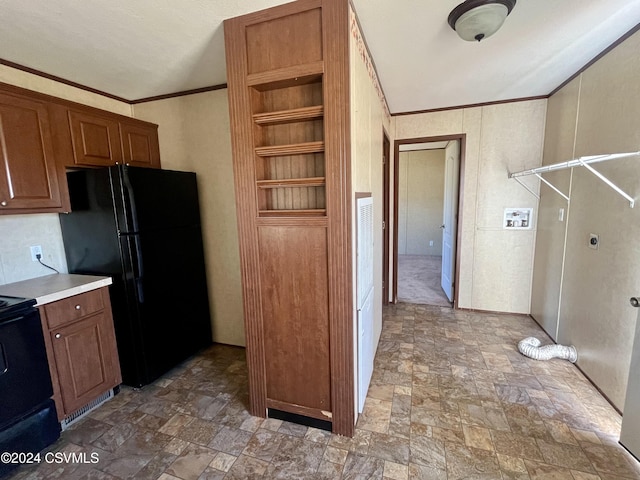 595 N 8th St, Mifflinburg, PA 17844 - kitchen with black appliances, stone tile floors, brown cabinets, light countertops, and built in shelves