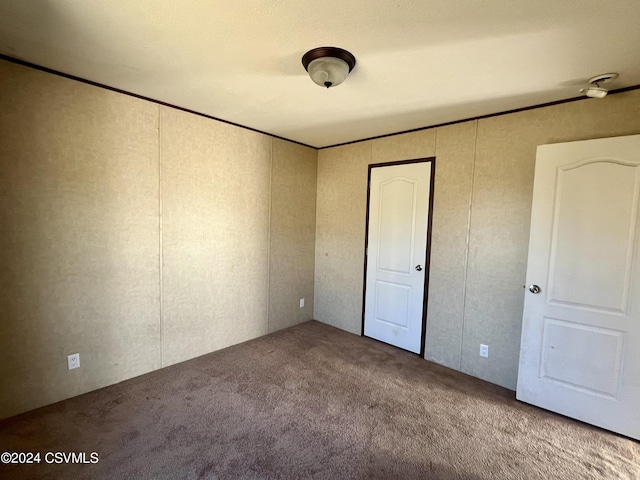 595 N 8th St, Mifflinburg, PA 17844 - unfurnished bedroom featuring carpet and crown molding