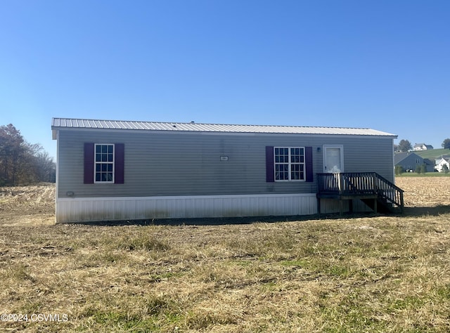 595 N 8th St, Mifflinburg, PA 17844 - view of property exterior featuring a metal roof