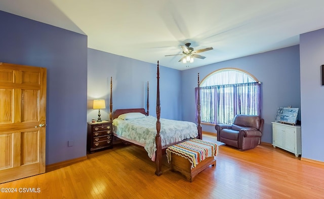 bedroom featuring ceiling fan and light hardwood / wood-style floors