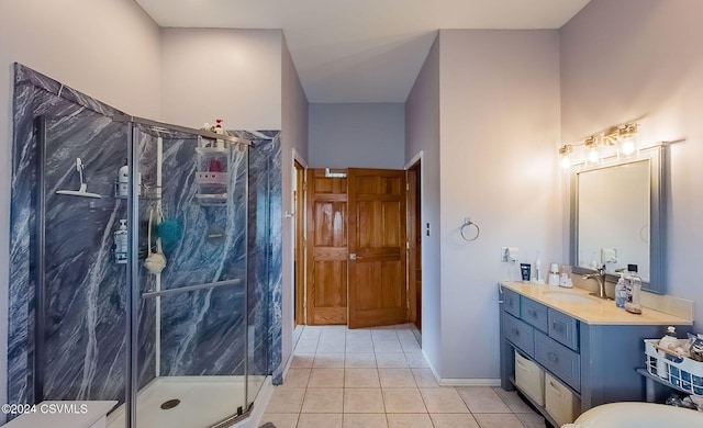 bathroom featuring vanity, walk in shower, and tile patterned floors