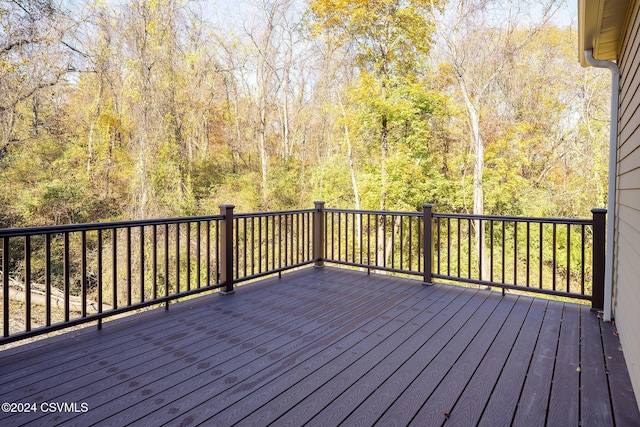 deck featuring a view of trees
