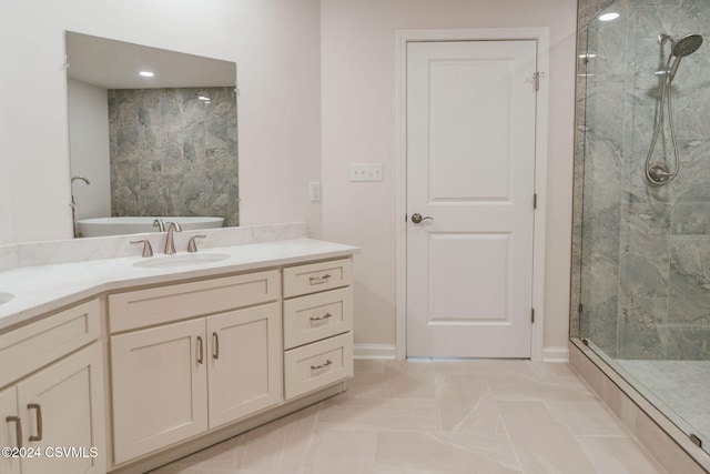 bathroom featuring vanity, tile patterned flooring, and plus walk in shower