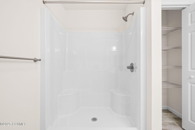 bathroom with walk in shower