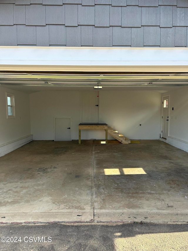 garage featuring baseboard heating