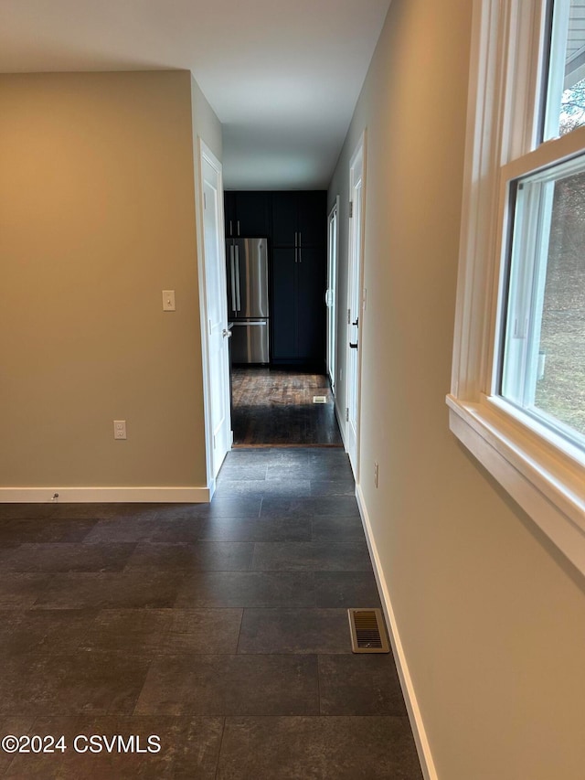 hallway featuring dark hardwood / wood-style floors