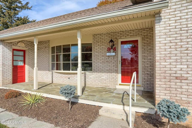 doorway to property featuring a porch