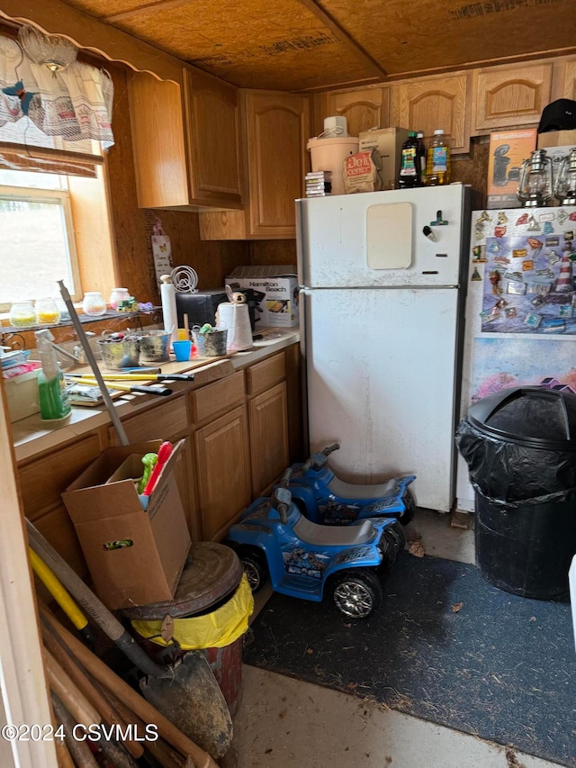 kitchen featuring white fridge