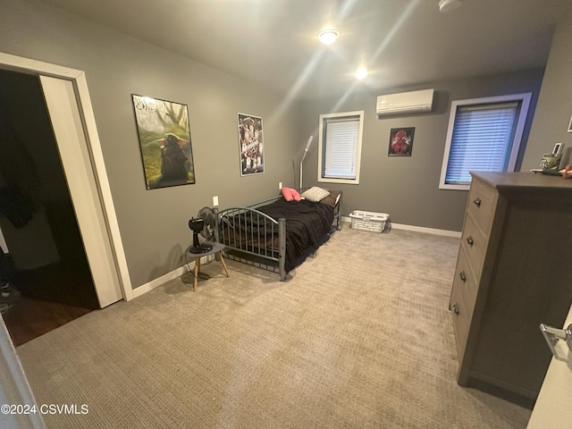 carpeted bedroom featuring a wall unit AC