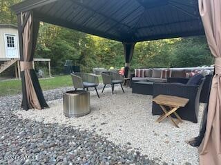 view of patio / terrace featuring a gazebo and an outdoor hangout area