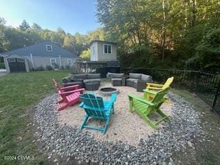 view of yard featuring a patio and a fire pit