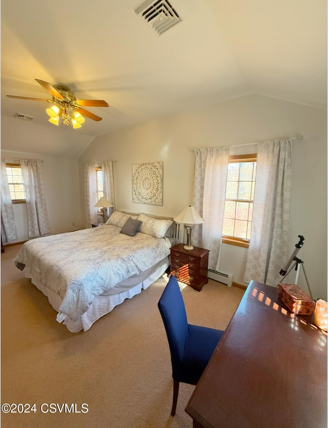 bedroom featuring ceiling fan, a baseboard radiator, vaulted ceiling, and carpet floors