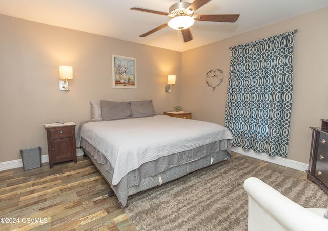 bedroom featuring ceiling fan and wood-type flooring