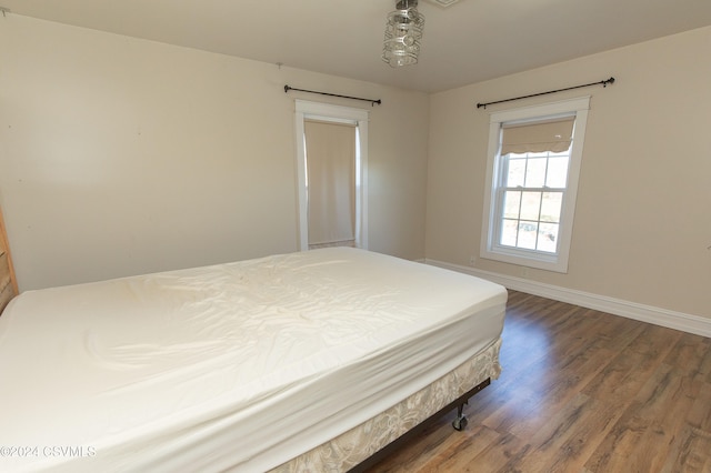 bedroom featuring dark hardwood / wood-style floors