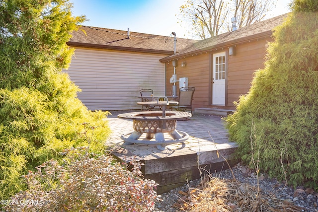 rear view of house featuring a patio