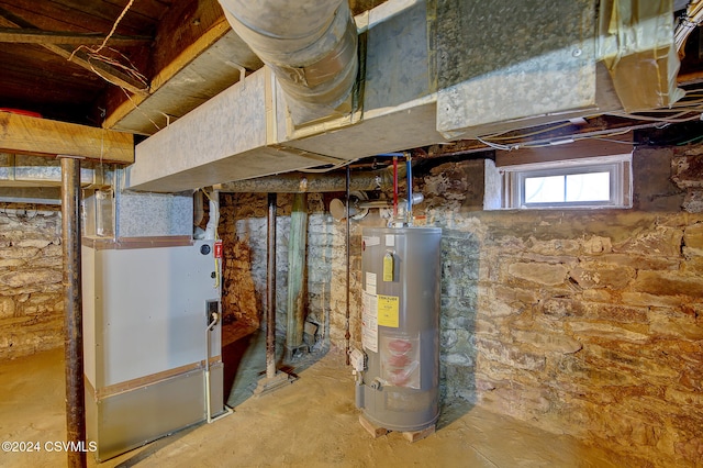 basement with water heater and heating unit