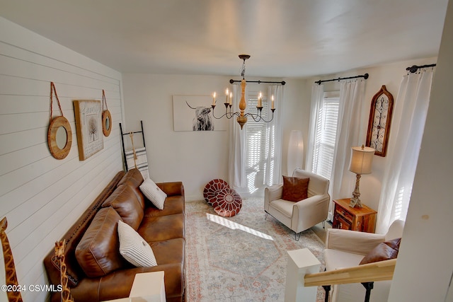 living room featuring an inviting chandelier