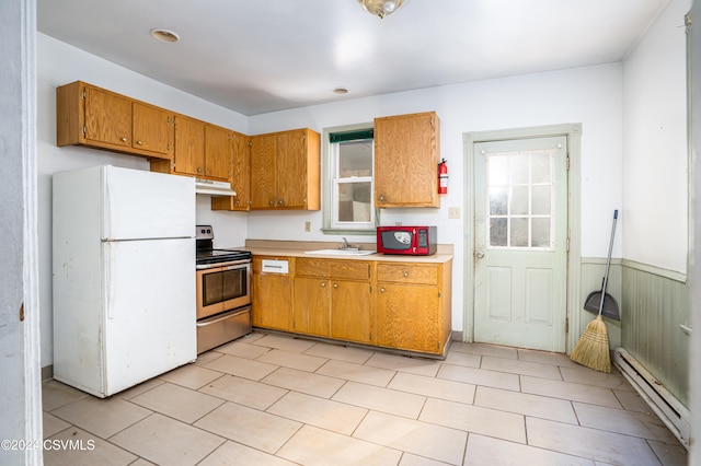 kitchen with sink, stainless steel range with electric cooktop, a baseboard radiator, and white refrigerator