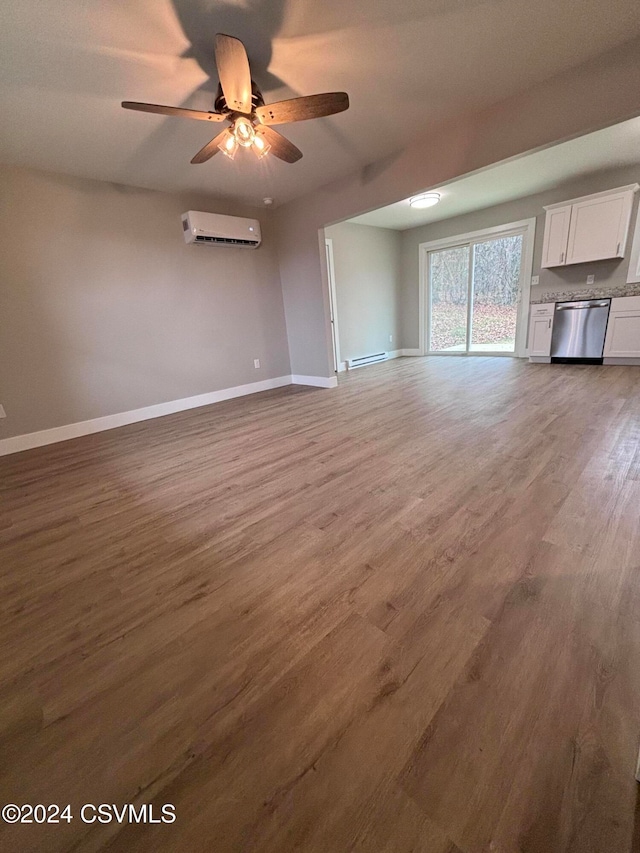 unfurnished living room featuring a wall unit AC, ceiling fan, hardwood / wood-style floors, and a baseboard radiator