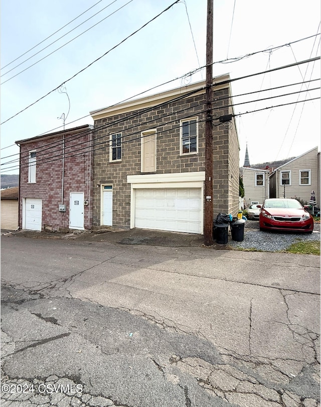 exterior space with a garage