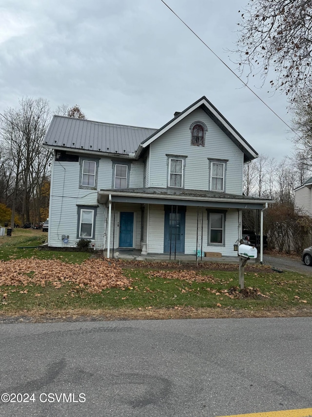 view of front of home featuring covered porch