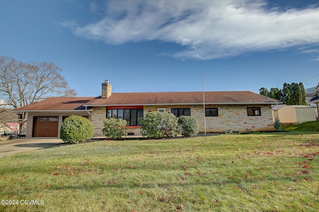 single story home featuring a front yard and a garage