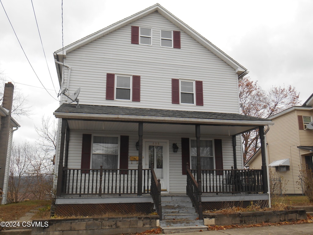 view of front facade featuring covered porch