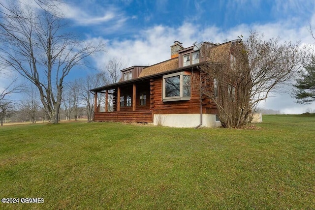 exterior space featuring a lawn