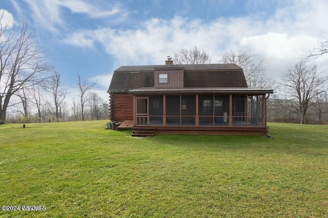 back of house featuring a yard