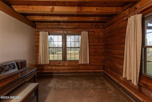 interior space with dark colored carpet, baseboard heating, log walls, beamed ceiling, and wood ceiling