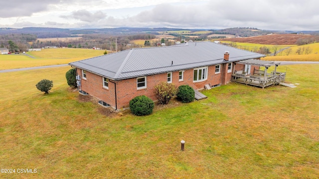 bird's eye view featuring a mountain view and a rural view