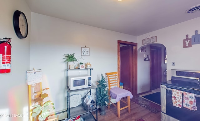 miscellaneous room with hardwood / wood-style floors