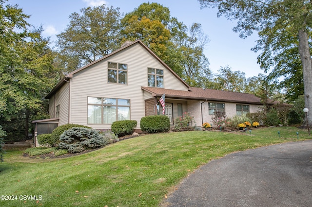 view of front property with a front lawn