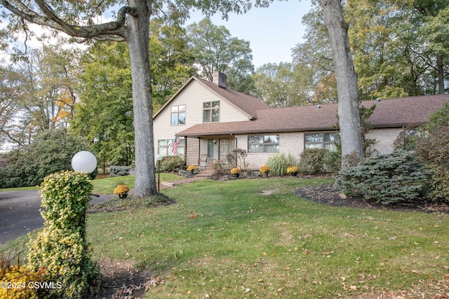 view of property with a front lawn