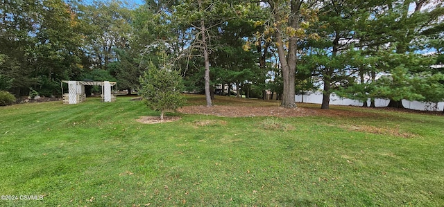 view of yard with a pergola