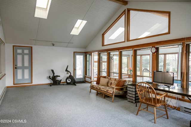 carpeted home office with beamed ceiling, plenty of natural light, high vaulted ceiling, and a skylight