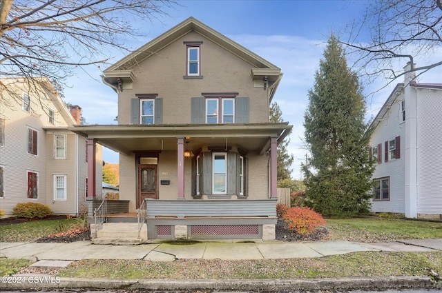 front facade featuring covered porch