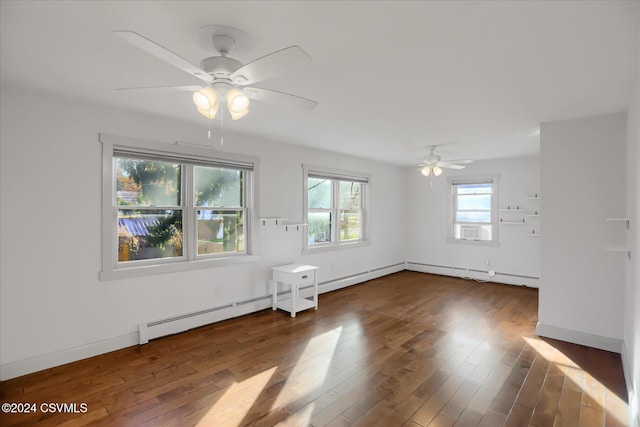 spare room featuring dark hardwood / wood-style floors and ceiling fan