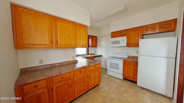 524 Front St, New Berlin, PA 17855 - kitchen with white appliances and brown cabinetry