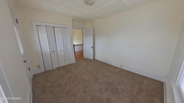 unfurnished bedroom with a closet and carpet floors