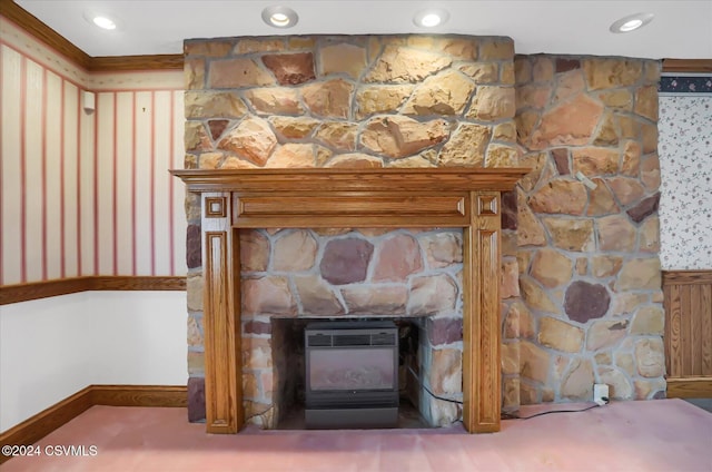 room details with carpet flooring, heating unit, and ornamental molding